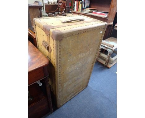 A VINTAGE VELLUM CABIN TRUNK