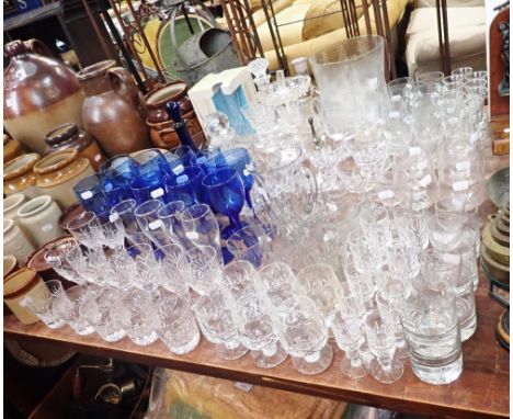 A REPRODUCTION BRISTOL BLUE GLASS DECANTER, a collection of blue glass wine glasses and similar glassware 