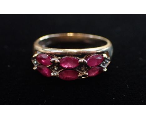 A 'RUBY' AND CLEAR STONE RING, on a 9ct yellow gold shank, ring size P (3.15 grams)