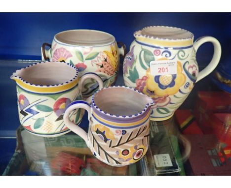 A TRADITIONAL POOLE POTTERY HAND PAINTED JUG, 15cm high, two smaller and a biscuit barrel (base) (4)