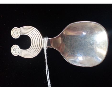 AN IRISH SILVER CADDY SPOON