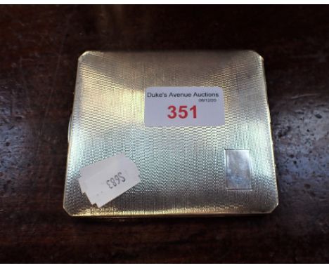 A SILVER CIGARETTE CASE with engine turned decoration, 9cm high