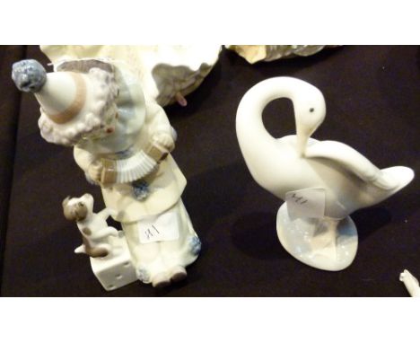 LLADRO FIGURES. Lladro clown with dog figure and a Lladro goose