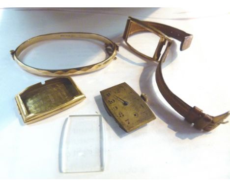 9CT WRISTWATCH. 9ct gold wristwatch and a 9ct gold metal core bangle
