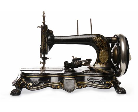 EARLY 20TH CENTURY FRISTER AND ROSSMAN FREE-STANDING SEWING MACHINEcast metal and enamel, with gilt decoration and abalone in