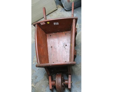 Wooden wheelbarrow planter. Not available for in-house P&amp;P 