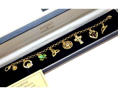 Brooks and Bentley Celtic Treasures charm bracelet, L: 20 cm. P&amp;P Group 1 (£14+VAT for the first lot and £1+VAT for subse