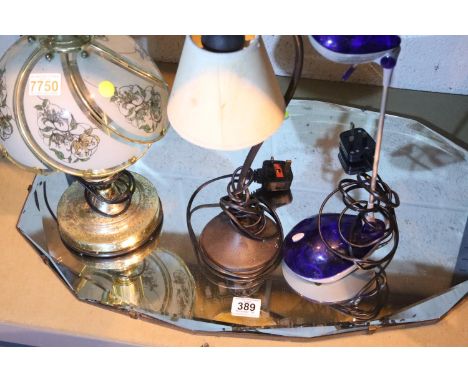 Three modern table lamps of various designs and a vintage mirror with a bevelled edge. Not available for in-house P&PConditio