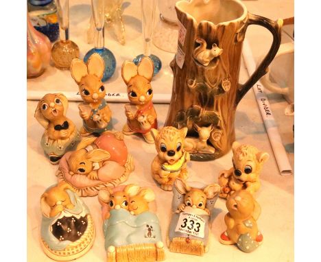 Ten Pendelfin ceramic figurines and a Hornsea single handled decorative water jug. Not available for in-house P&amp;P 