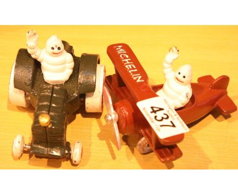 Cast iron Michelin man in tractor and a Michelin man in plane, L: 12 cm (both). P&amp;P Group 2 (£18+VAT for the first lot an