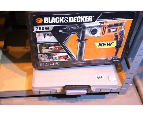 Black and Decker 750w electric drill and case and a cased tool box containing spanner, sockets etc. Not available for in-hous