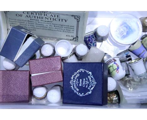 Box containing a selection of ceramic, copper and plated thimbles. P&amp;P Group 1 (£14+VAT for the first lot and £1+VAT for 