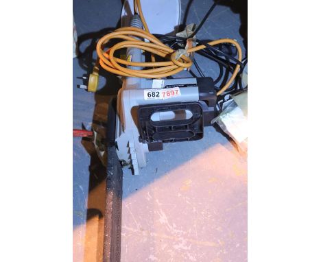 Titan TTB355CHN electric chainsaw. Not available for in-house P&PCondition Report: All electrical items in this lot have been