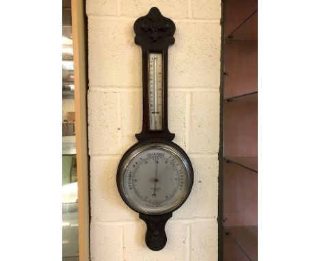 Aneroid barometer by W. J. Carroll, approx 79cm in length