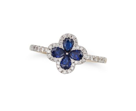 A SAPPHIRE AND DIAMOND FLOWER DRESS RING of quatrefoil design, set with four pear cut blue sapphires in a border of round cut