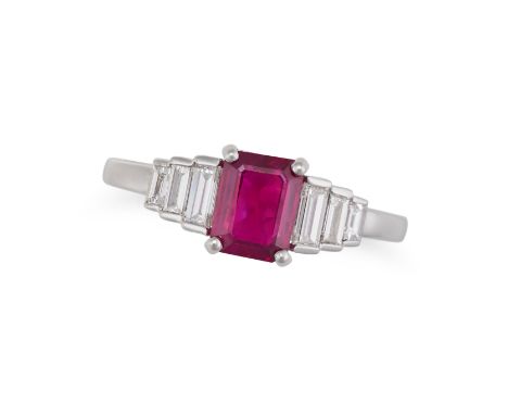 A BURMESE RUBY AND DIAMOND RING set with an octagonal step cut ruby of 1.07 carats accented on each side by baguette cut diam