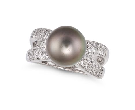 A BLACK PEARL AND DIAMOND DRESS RING in 18ct white gold, set with a black pearl of 10.5mm, the bifurcated band pave set with 