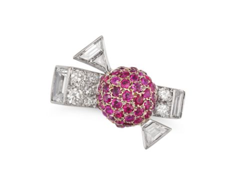 A RUBY AND DIAMOND BOW RING pave set with round cut rubies and round and baguette cut diamonds, no assay marks, size I / 4, 9