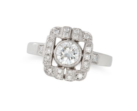 A DIAMOND DRESS RING set to the centre with a round brilliant cut diamond of approximately 0.60 carats in an openwork border 