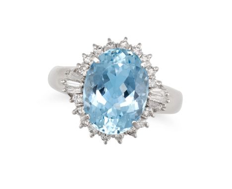 AN AQUAMARINE AND DIAMOND DRESS RING set with an aquamarine of 3.82 carats in a border of round brilliant and tapered baguett