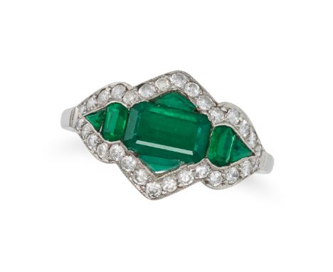 AN EMERALD AND DIAMOND RING set with step cut emeralds in a border of round brilliant cut diamonds, no assay marks, size K1/2