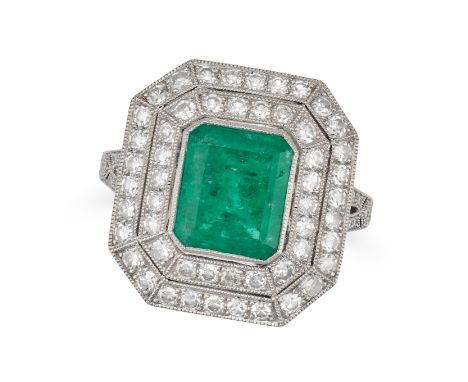 AN EMERALD AND DIAMOND RING set with an octagonal step cut emerald of approximately 2.24 carats in a double border of single 