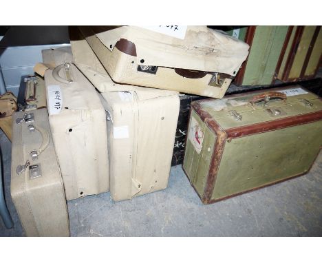 Collection of eight early to mid-century suitcases&nbsp;including a pair of Varmer Limited, a Rev Robe, some canvas covered a