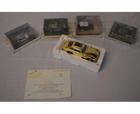 4 James Bond die cast model cars and a Danbury Mint 22ct gold plated 007 Aston Martin DB5