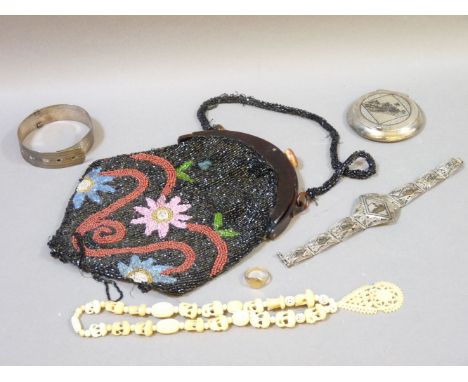 A vegetable ivory necklace, a Niello work bracelet, a bead work bag, a 9ct gold signet ring, and a Niello work compact