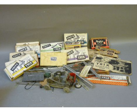 A box of Meccano, and The Trix Complete Engineering Manual