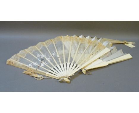 A collection of fans, including 19th century examples of a hand painted fan with bone sticks and guard sticks, and a printed 