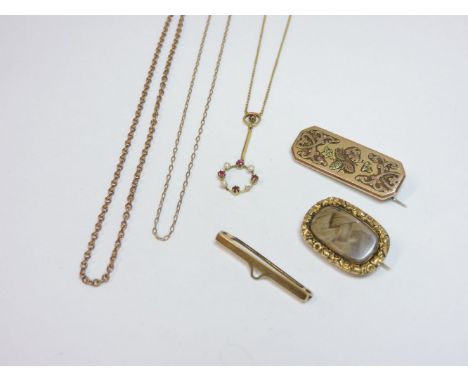 A ruby and seed pearl gold pendant, three gold brooches, and two gold chains