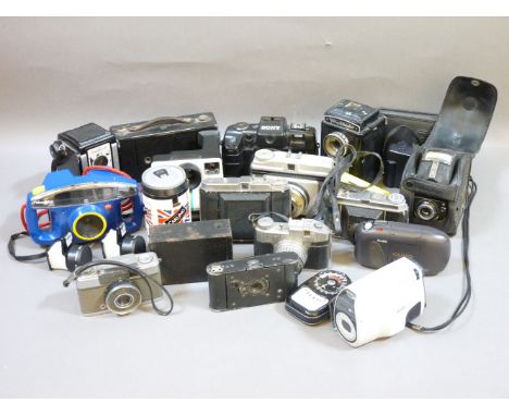 A collection of cameras, including a Carling 'Le Football', a beer can camera, a Thunderbirds Are Go camera, a Voigllander 'B