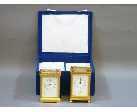 A brass carriage clock, enamel dial with Roman numerals, with subsidiary seconds dial, chip to enamel, and another brass carr