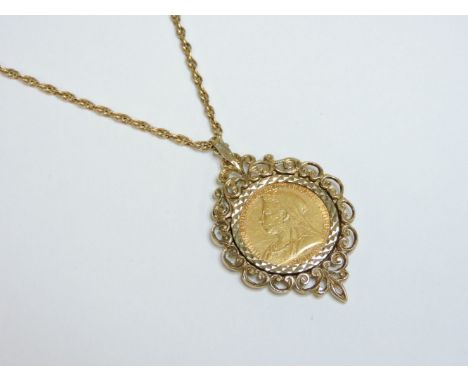 A full sovereign pendant, dated 1893, in a 9ct gold pendant mount, on a gold Prince of Wales chain