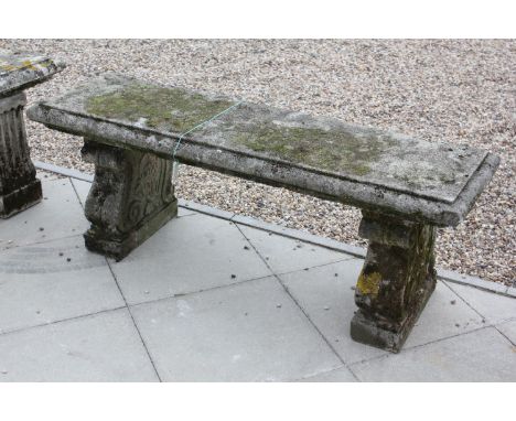 A reconstituted stone bench, 130cm long