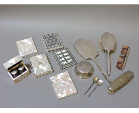 Three Victorian mother of pearl card cases, two further mosaic card cases, two bottles in a box, and silver dressing table it