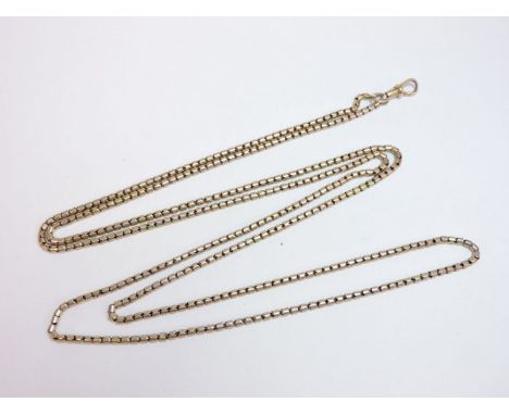 A gold tube link guard chain, tested as approximately 9ct gold, 22.2g approximately