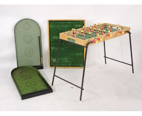 Two football games, two bagatelle games, Lego, Action Man figures, plastic soldiers, cowboys and Indians, and various dolls 