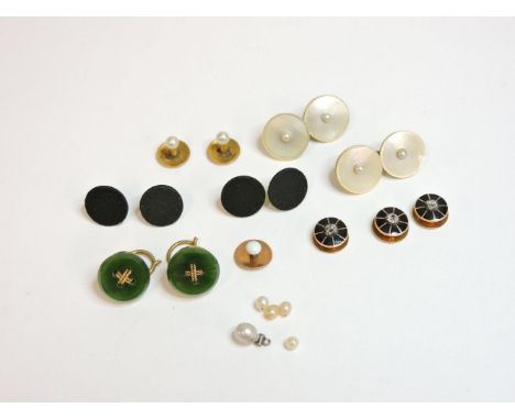 A set of three diamond set gold dress studs, with black enamel decoration, two nephrite gold buttons, a diamond and pearl dro