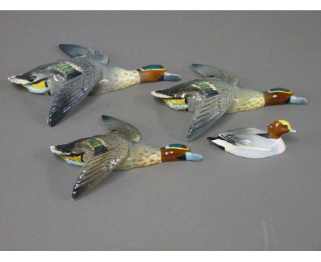 A Beswick three piece teal wall plaque set, 1530, together with a Beswick 'Peter Scott' wigeon