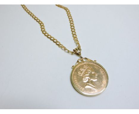 A three pound piece gold coin pendant, the coin dated 1995, channel set to a scroll top mount suspended on a 9ct gold filed c