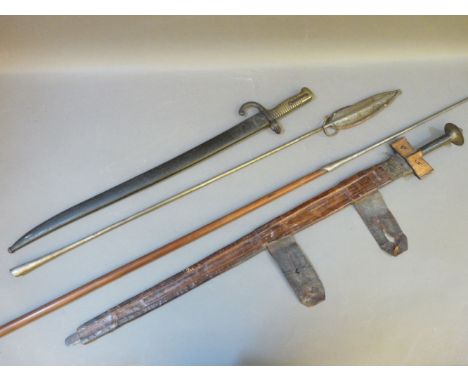 A WWI German bayonet, stamped Kirschbaum to the blade, with metal scabbard, an African spear, from Kenya and the Pokot/Suk tr