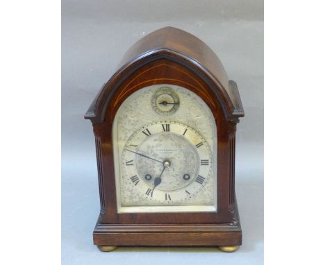 A mahogany lancet shaped mantle clock, the engraved and silvered dial inscribed Pearce & Son Ltd, Leicester, 30.5cm high