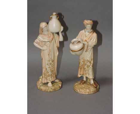 A pair of Royal Worcester Arab figures, each carrying a jar, no 1250, tallest 25cm