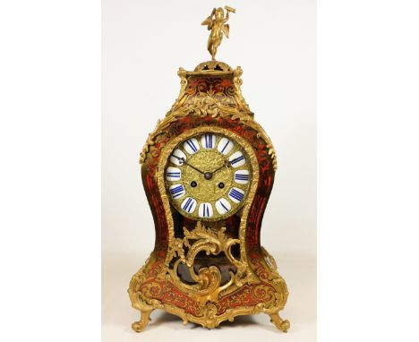 20th century simulated tortoiseshell boullework mantel clock, cartouche shaped case with putti finial, circular dial with Rom