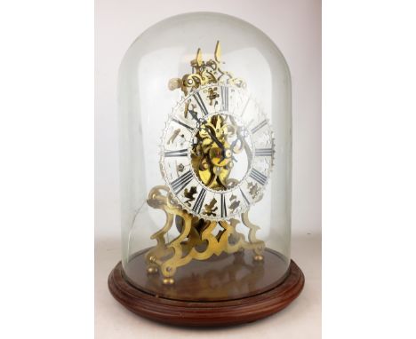 20th century Gothic style brass skeleton clock, with shaped silvered Roman chapter ring and single fusee movement, on circula