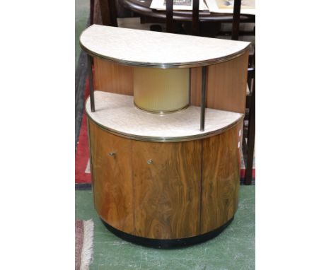 A 1960s retro walnut veneer demi-lune miniature cocktail bar, with integral light, by Validity Furniture, London, 80cm high, 