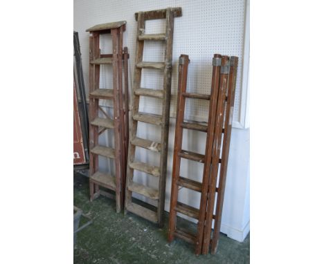 Vintage ladders - a six rung stepladder; a thatcher's ladder; three stage extending step ladder (3)