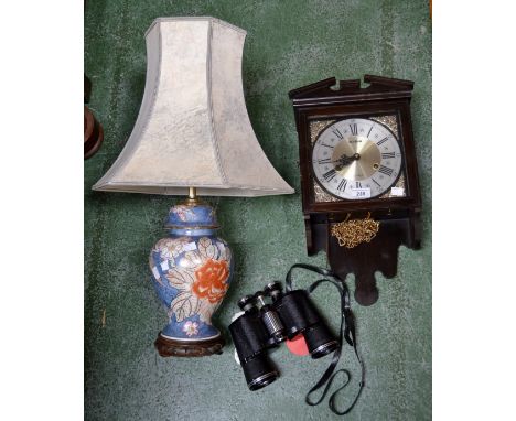 An Acctim 31 day wall clock; a pair of Boots Admiral II binoculars, 10 x 50mm,cased; a table lamp (3)